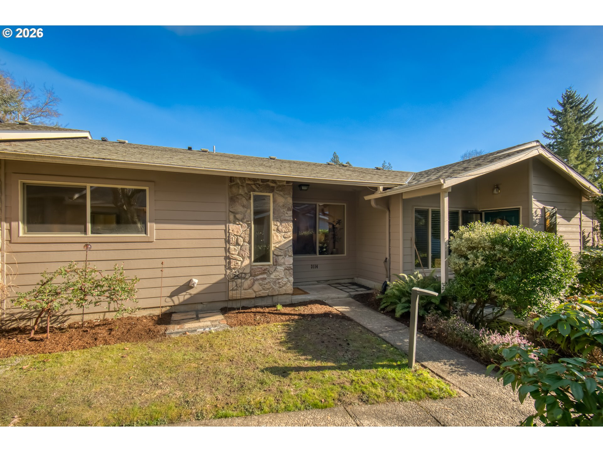 3114 Southwest Carson Street Portland, OR 97219 - Photo 1 of 18 a view of house with backyard and outdoor space
