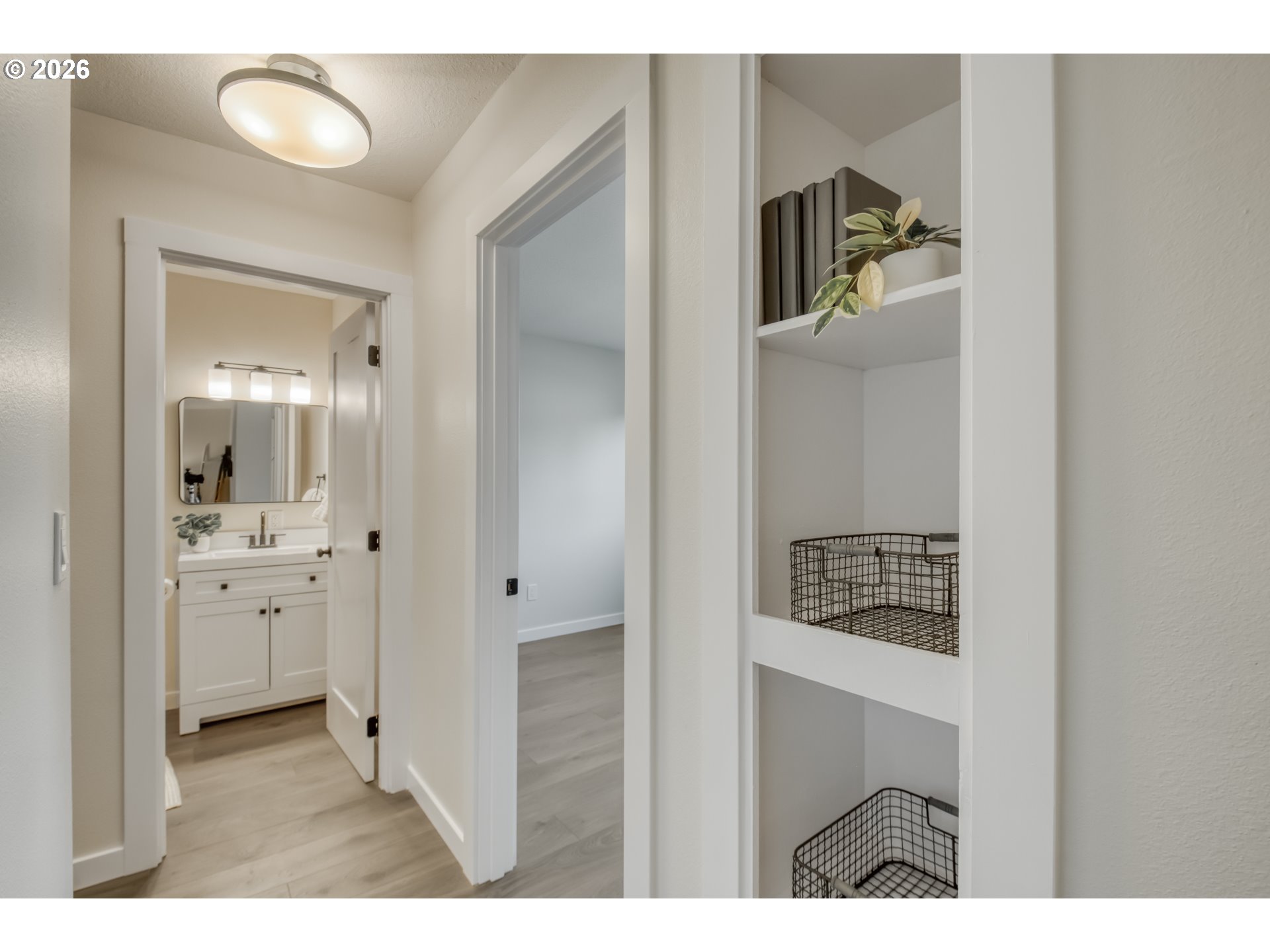 3114 Southwest Carson Street Portland, OR 97219 - Photo 12 of 18 a bathroom with a sink and a mirror