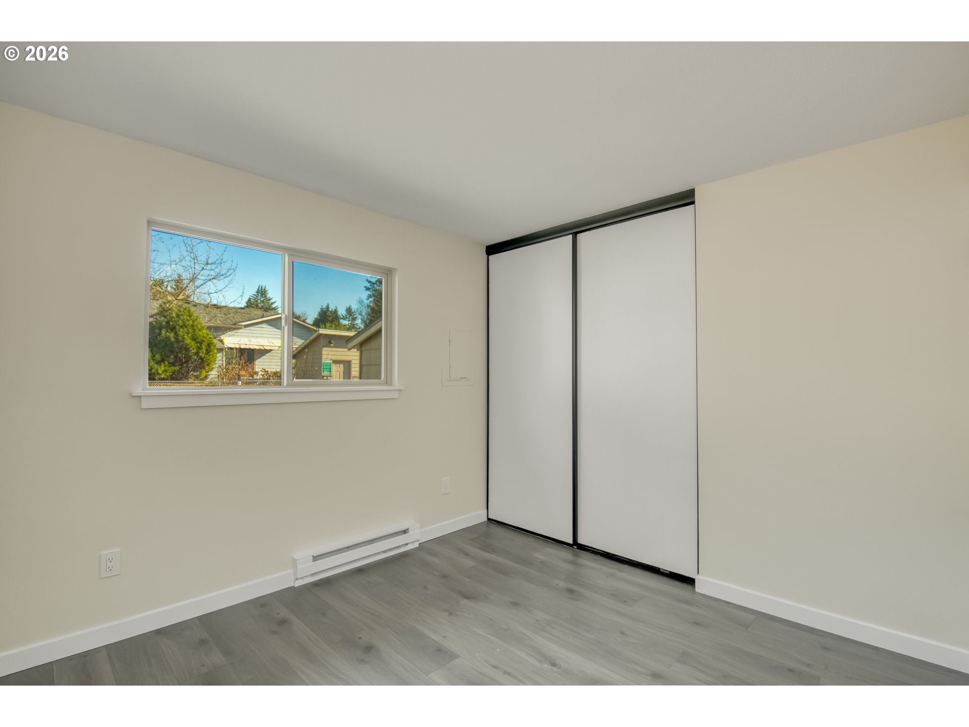 3114 Southwest Carson Street Portland, OR 97219 - Photo 14 of 18 a view of an empty room with painting on the wall