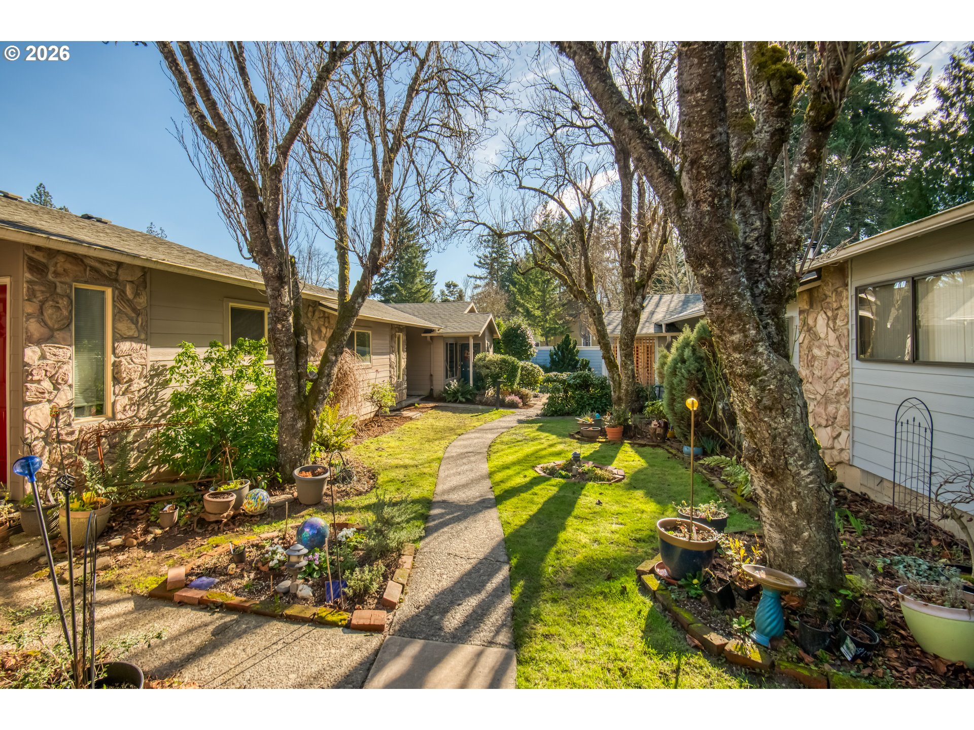 3114 Southwest Carson Street Portland, OR 97219 - Photo 2 of 18 a view of a yard with plants