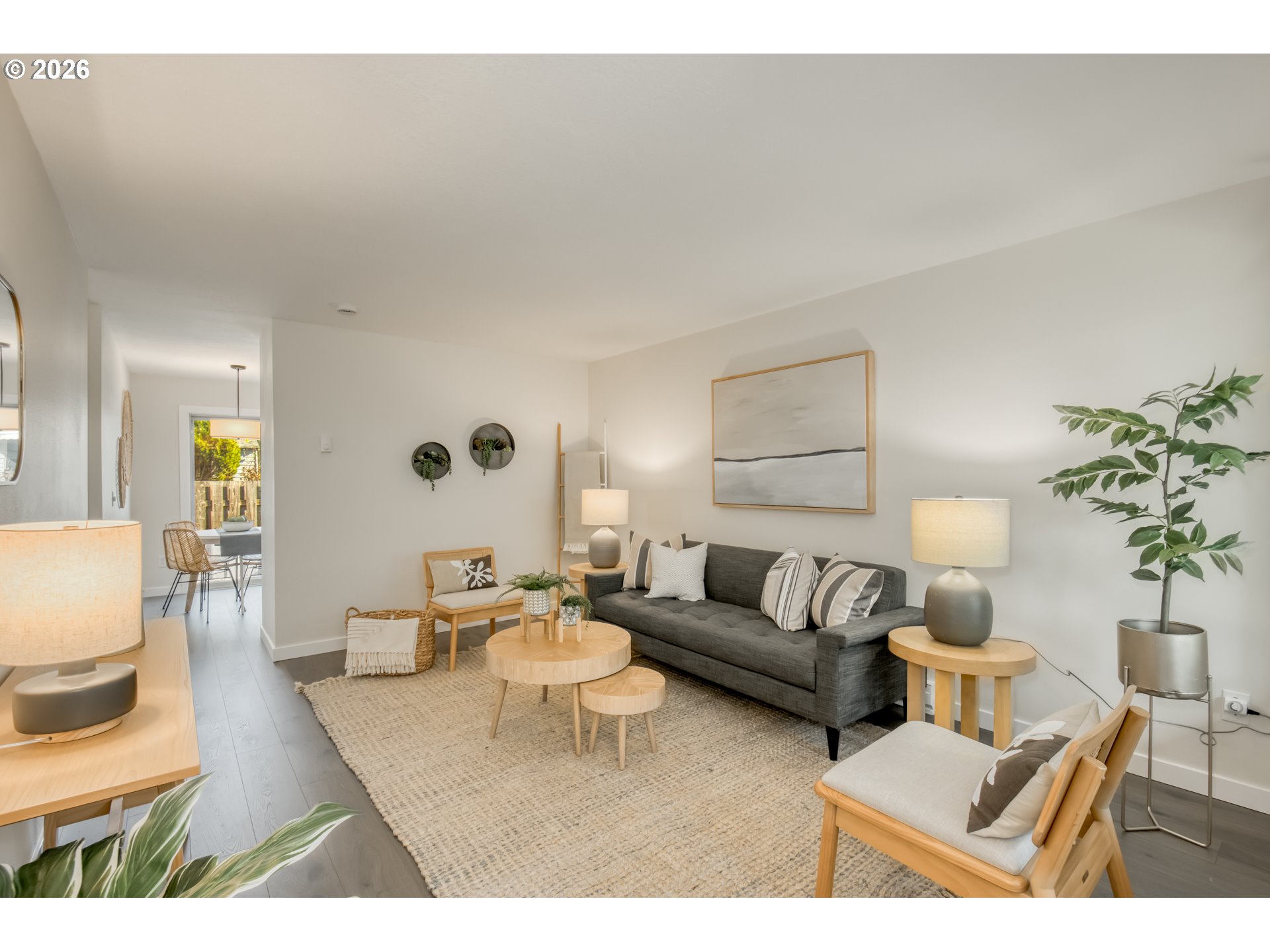 3114 Southwest Carson Street Portland, OR 97219 - Photo 5 of 18 a living room with furniture and a lamp