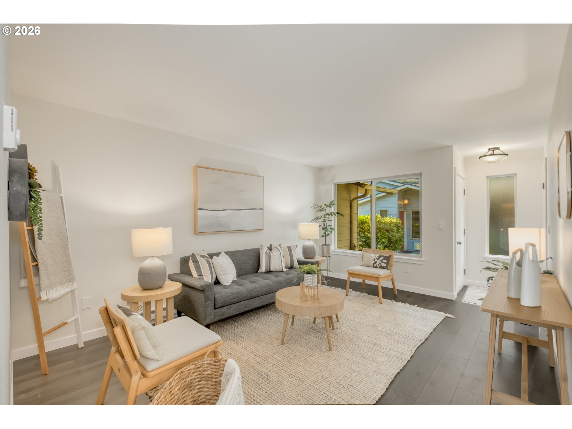 3114 Southwest Carson Street Portland, OR 97219 - Photo 6 of 18 a living room with furniture and wooden floor