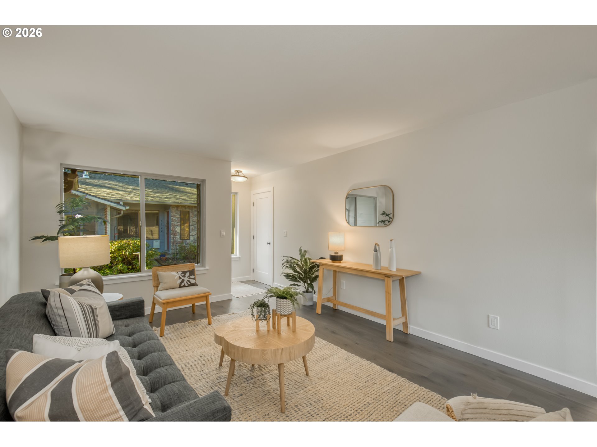 3114 Southwest Carson Street Portland, OR 97219 - Photo 7 of 18 a living room with furniture