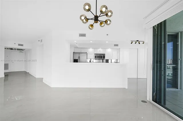 a view of a kitchen with a sink