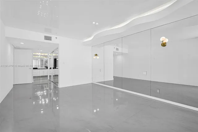 a bathroom with a sink and shower