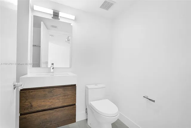 a view of a lake with a yard