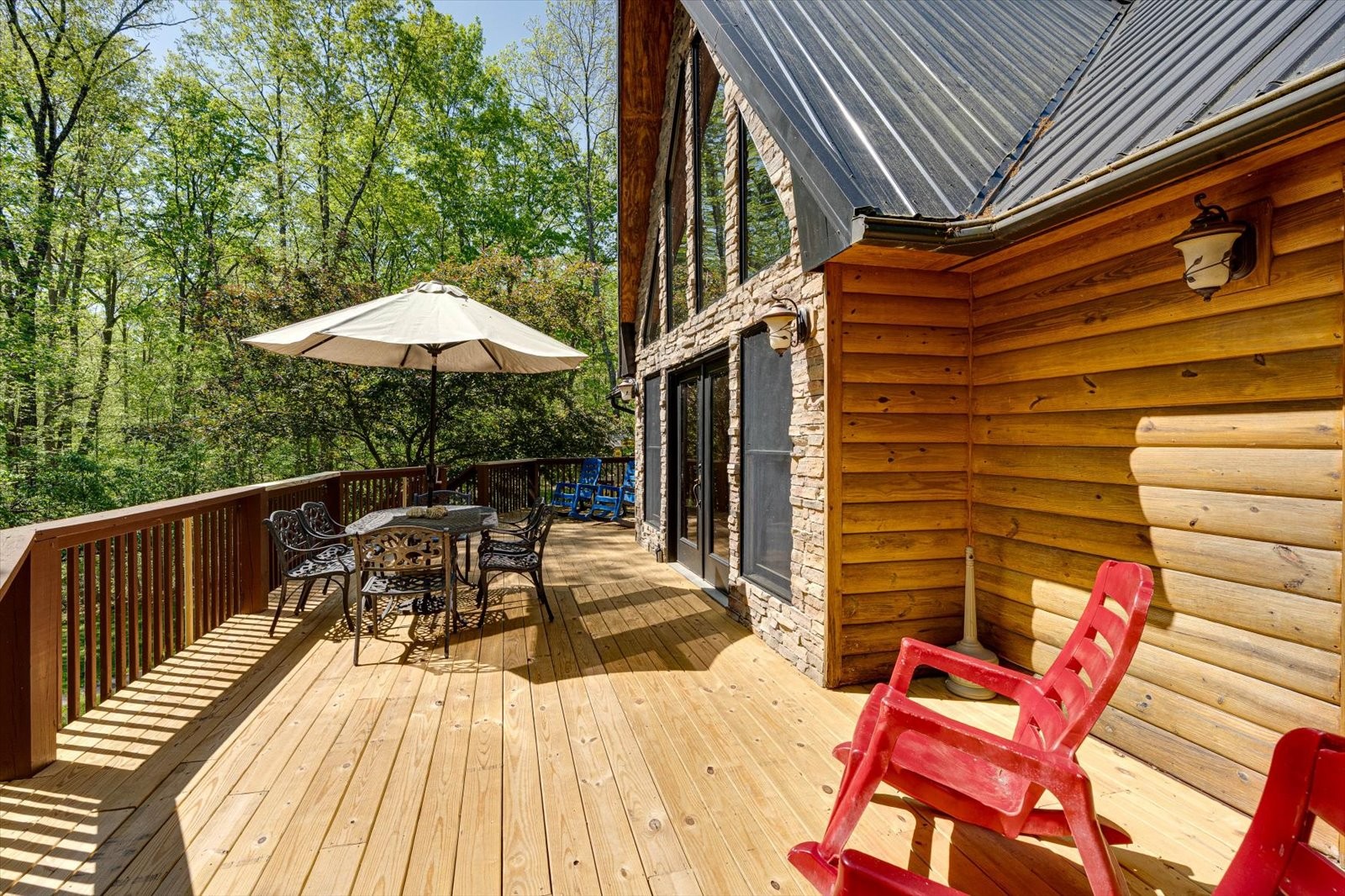 557 Green Forest Road Dunlap, TN 37327 - Photo 14 of 57 a view of backyard with outdoor seating and wooden floor