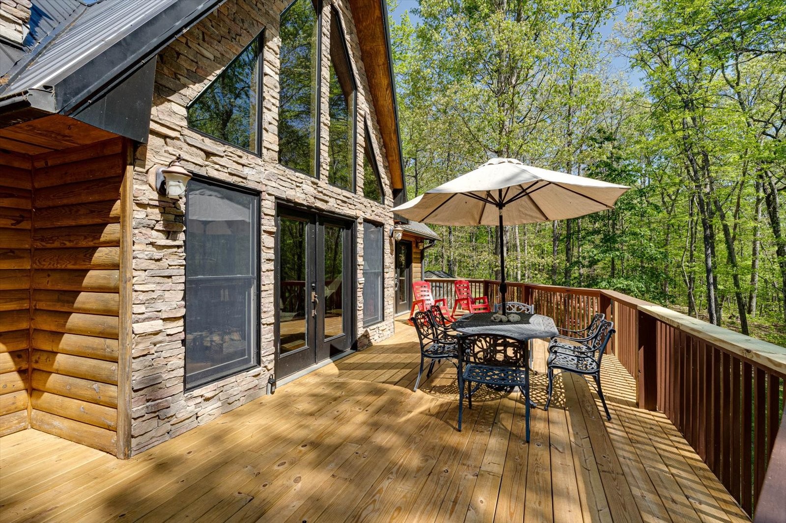 557 Green Forest Road Dunlap, TN 37327 - Photo 15 of 57 a view of a chairs and table in the balcony