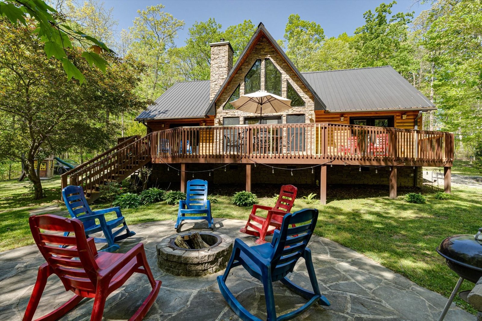 557 Green Forest Road Dunlap, TN 37327 - Photo 2 of 57 a view of a wooden chairs and table in the patio