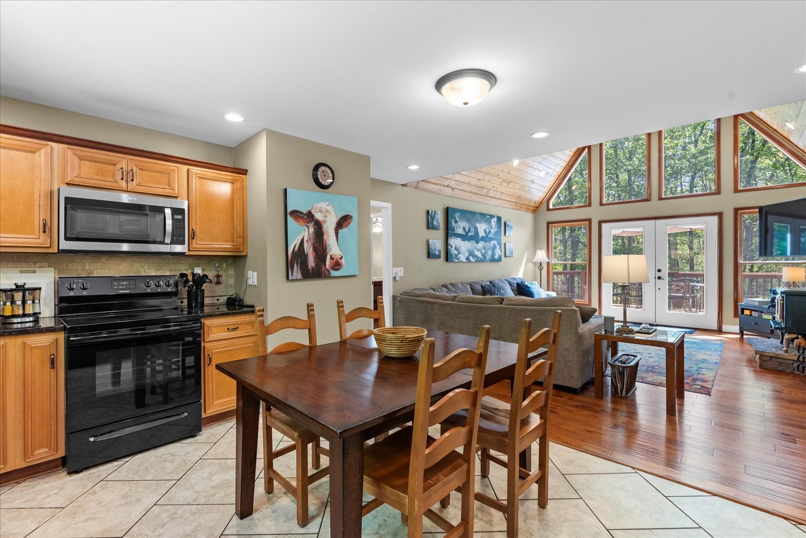 557 Green Forest Road Dunlap, TN 37327 - Photo 21 of 57 a view of a dining room with furniture window and wooden floor