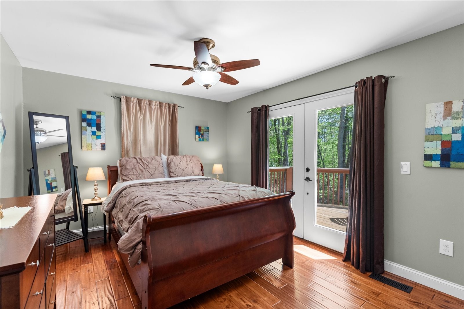 557 Green Forest Road Dunlap, TN 37327 - Photo 32 of 57 a bed room with a bed and a chandelier
