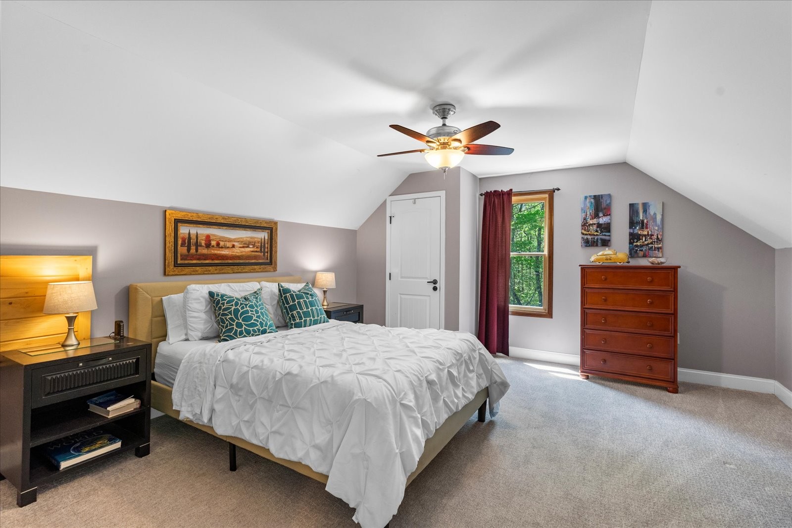 557 Green Forest Road Dunlap, TN 37327 - Photo 38 of 57 a bedroom with a bed and a chandelier
