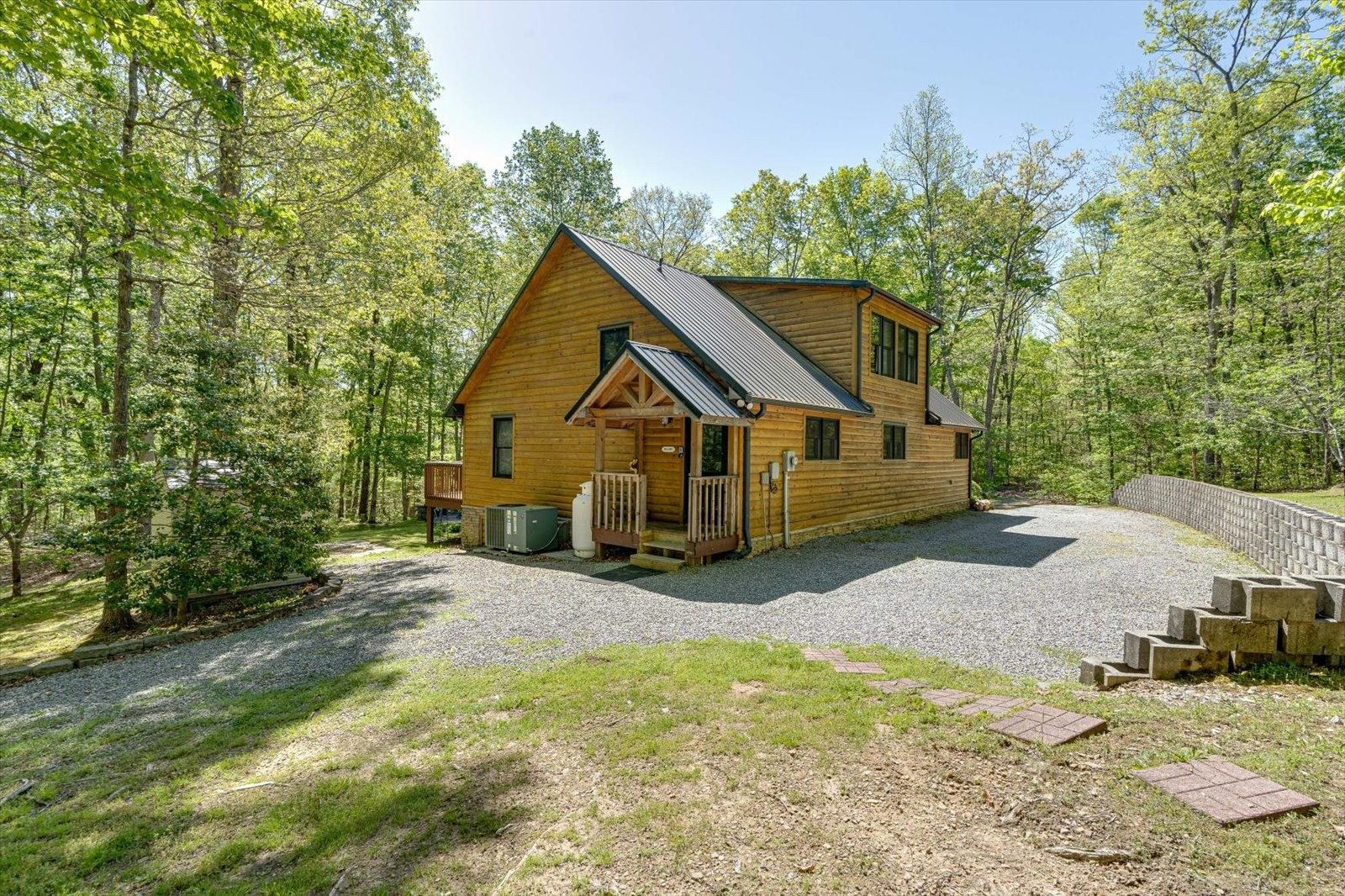 557 Green Forest Road Dunlap, TN 37327 - Photo 4 of 57 a view of a house with wooden fence