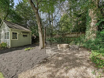 a view of backyard with green space
