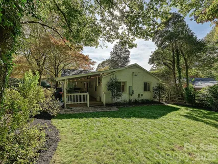 a house view with a garden space