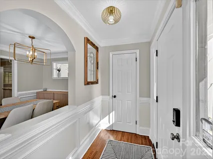 a spacious bedroom with a bed and a window