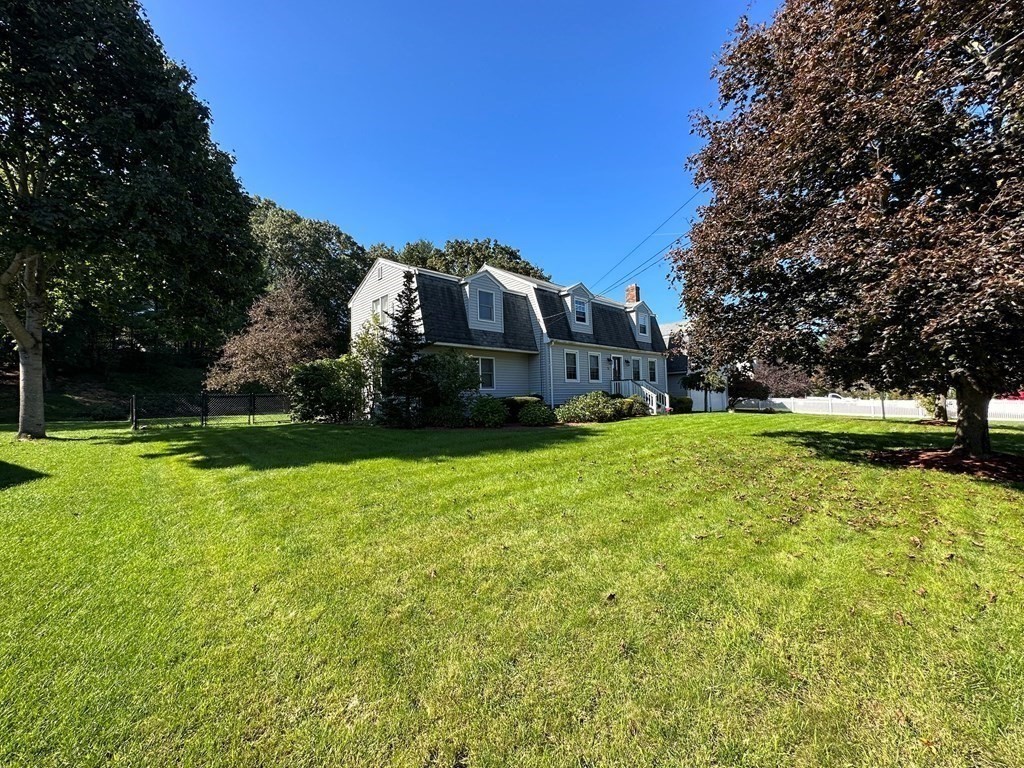 75 Blake Road Wrentham, MA 02093 - Photo 21 of 24 a view of a house with a big yard