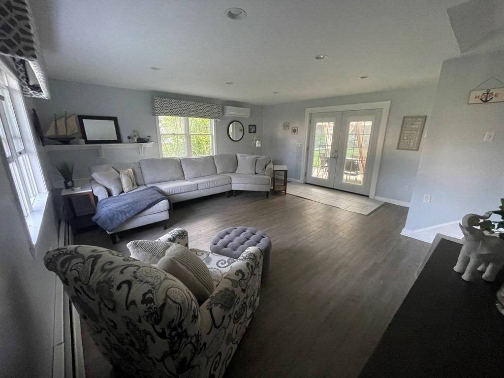 75 Blake Road Wrentham, MA 02093 - Photo 3 of 24 a living room with furniture and a large window