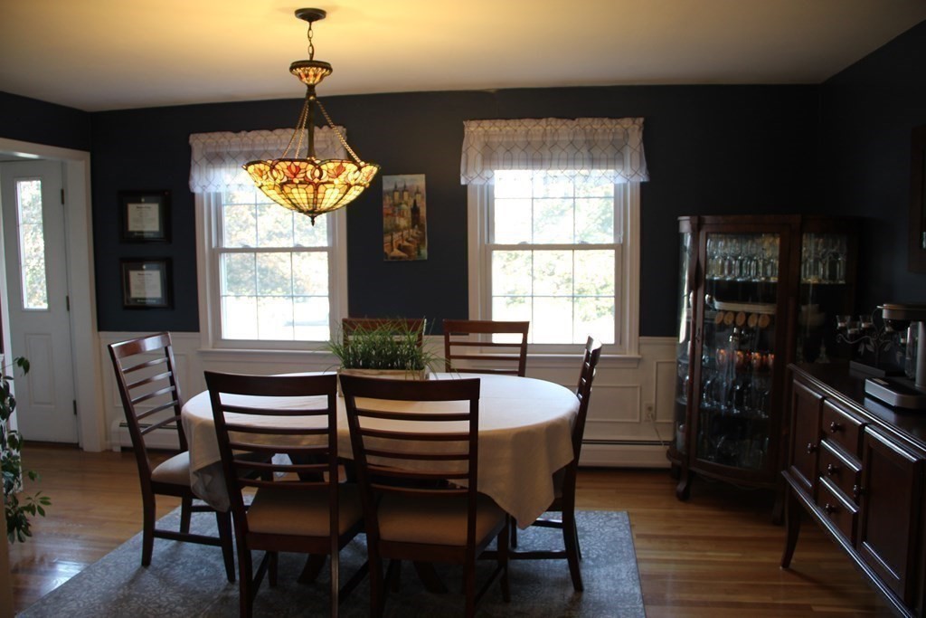 75 Blake Road Wrentham, MA 02093 - Photo 8 of 24 a view of a dining room with furniture window and wooden floor