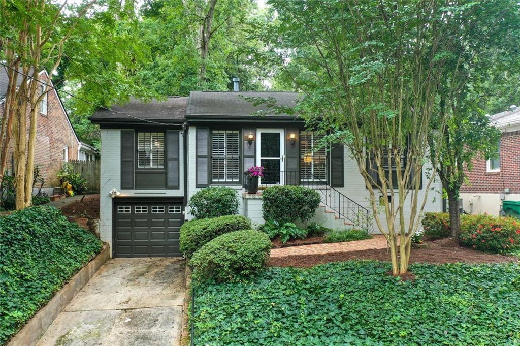 1725 Coventry Road Decatur, GA 30030 - Photo 1 of 1 a front view of a house with a yard