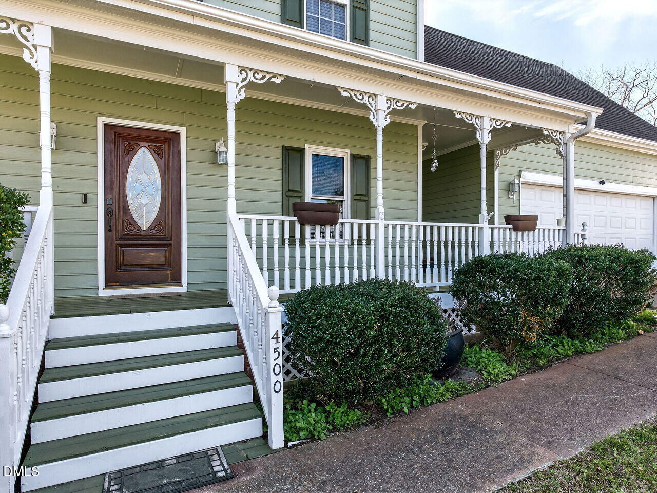 4500 Rivershyre Way Raleigh, NC 27616 - Photo 3 of 42 a front view of a house with a garden