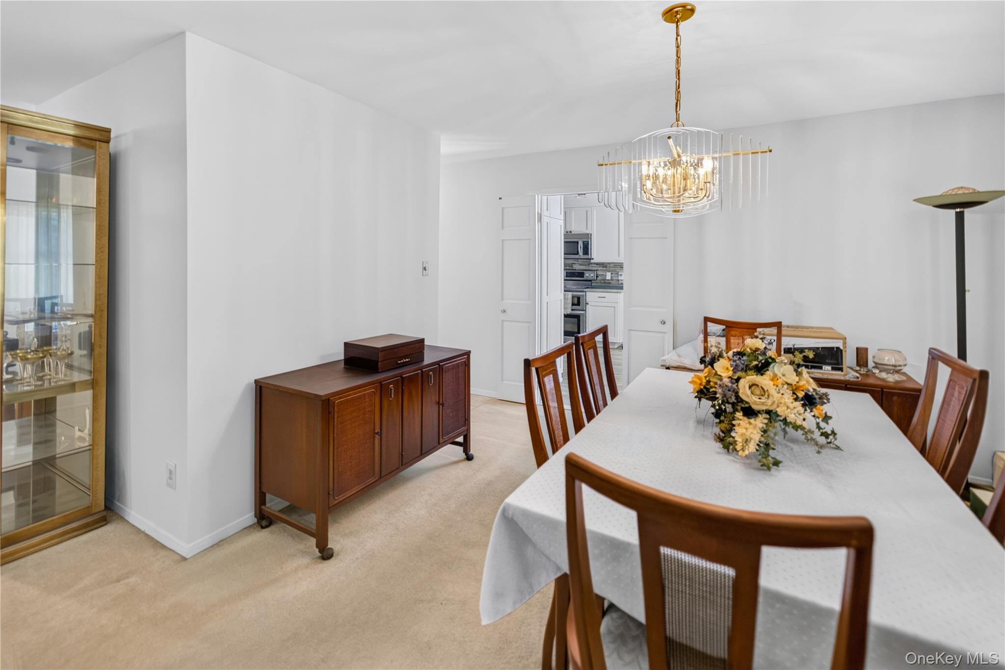261 Hallock Road Stony Brook, NY 11790 - Photo 4 of 13 a view of a dining room with furniture