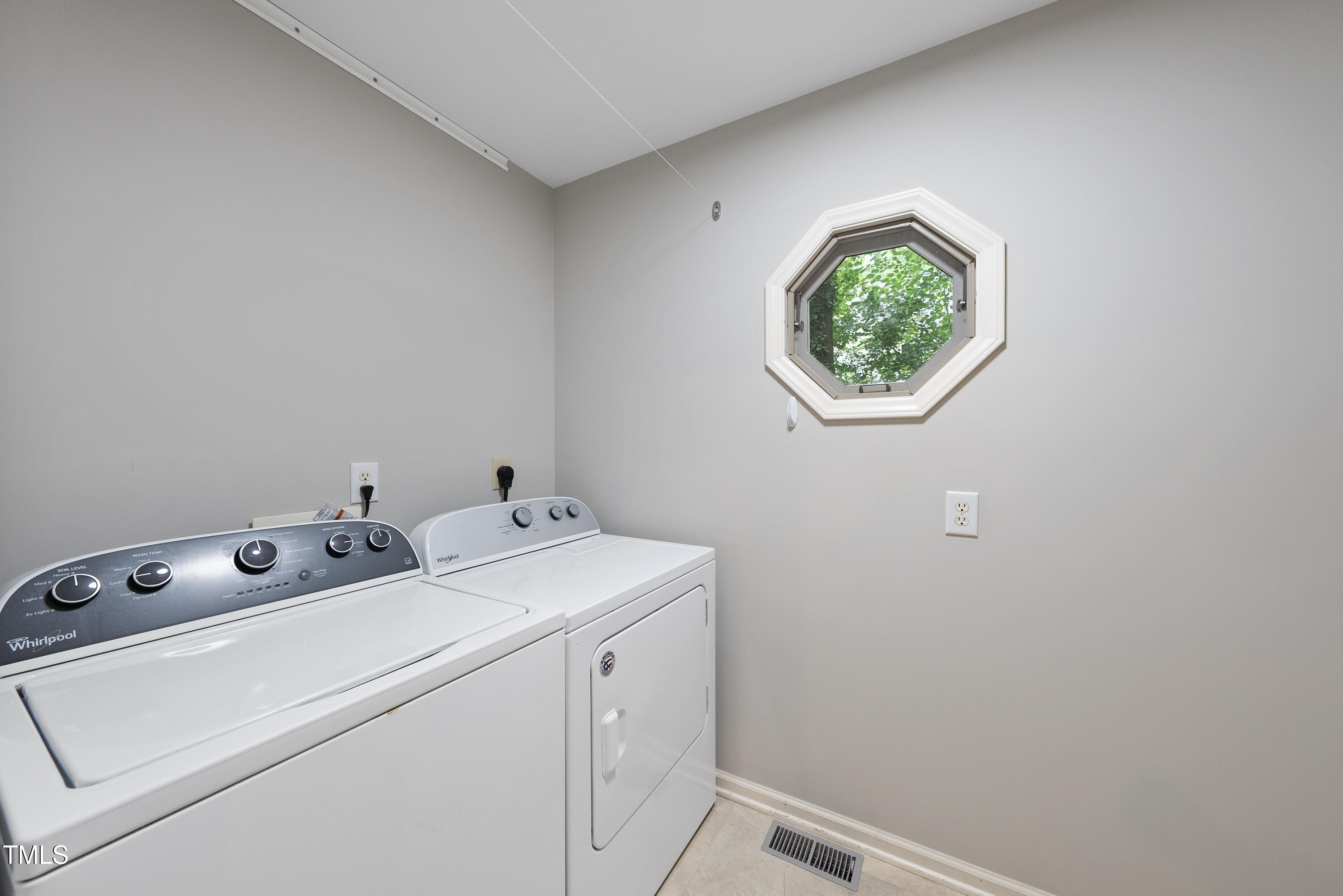3517 Eden Croft Drive Raleigh, NC 27612 - Photo 12 of 22 a utility room with dryer and washer