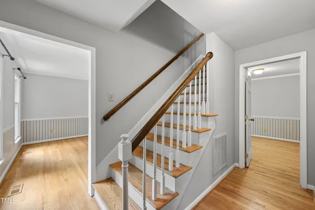 a view of entryway with wooden floor