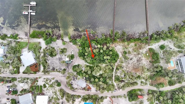 a view of a lake with a bench and lake view