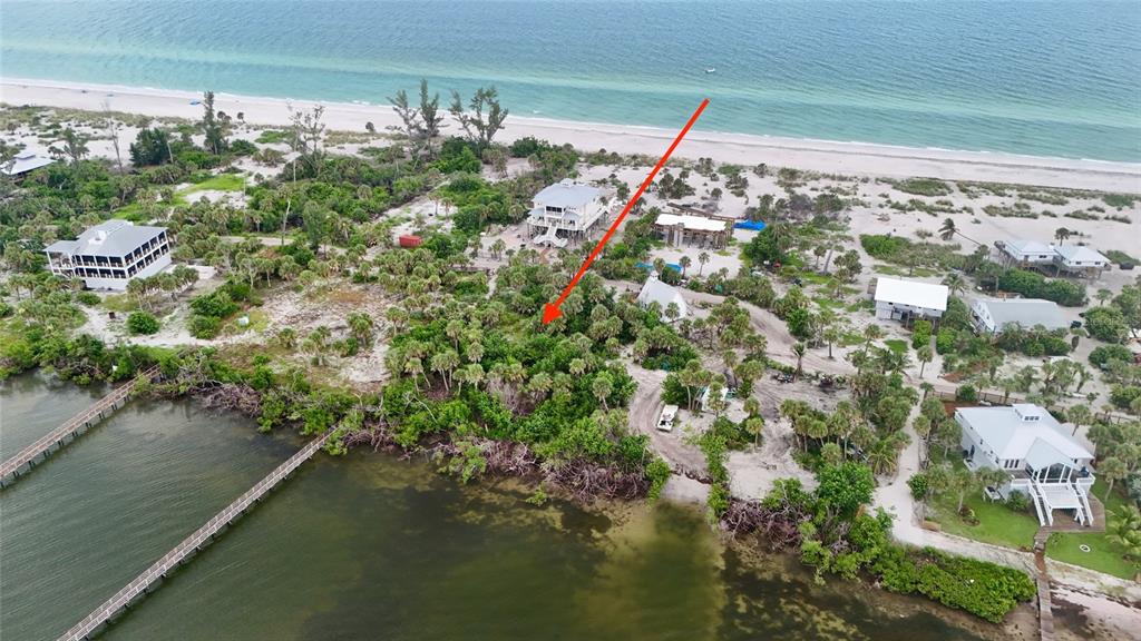 9144 Carter Street Placida, FL 33946 - Photo 2 of 19 a view of a lake with a house