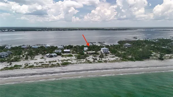 a view of a lake with a yard