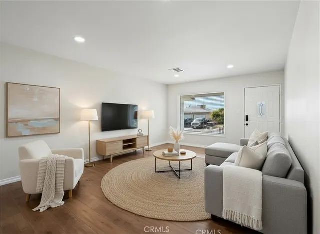 a kitchen with stainless steel appliances granite countertop a stove and a refrigerator