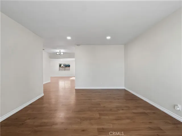 a kitchen with stainless steel appliances a sink stove and cabinets