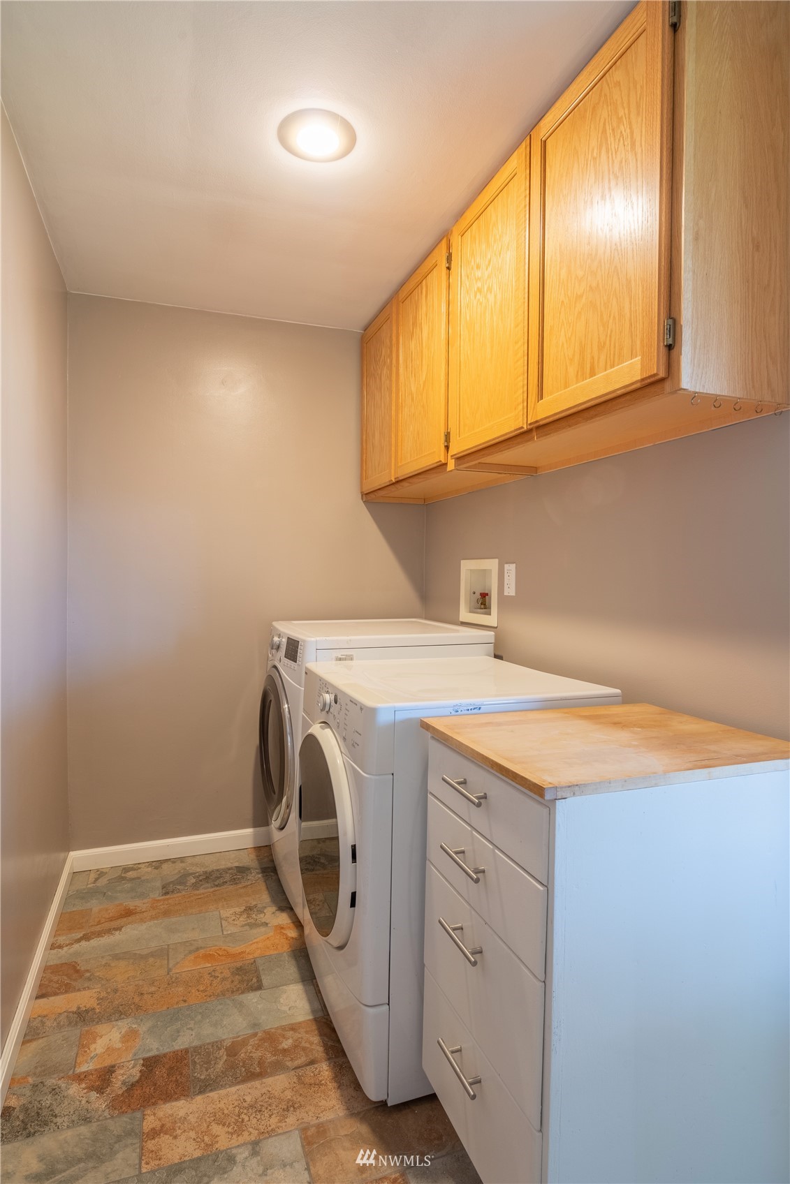 383 Maringo Road Ephrata, WA 98823 - Photo 12 of 29 a utility room with a sink a washer and dryer
