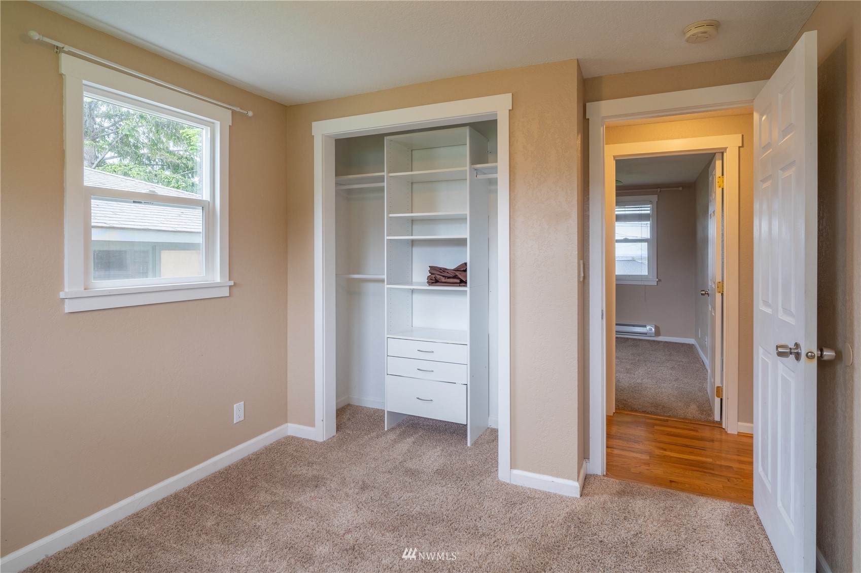 383 Maringo Road Ephrata, WA 98823 - Photo 16 of 29 an empty room that has a wooden closet door