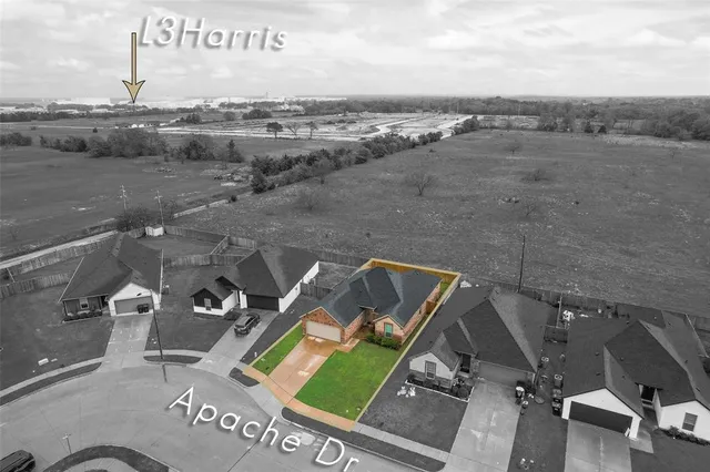 an aerial view of a tennis ground