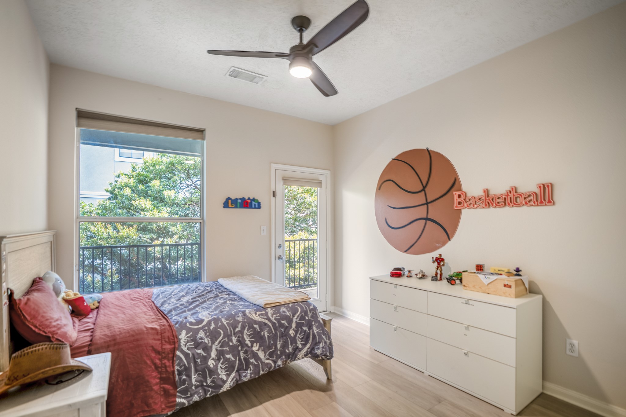 4236 Drake Street Houston, TX 77005 - Photo 28 of 43 The other second floor bedroom, also with private balcony access, creates a bright and inviting retreat, complete with a generous closet.