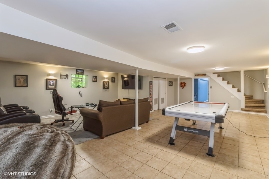 6129 North Mason Avenue Chicago, IL 60646 - Photo 15 of 22 a living room with furniture and wooden floor