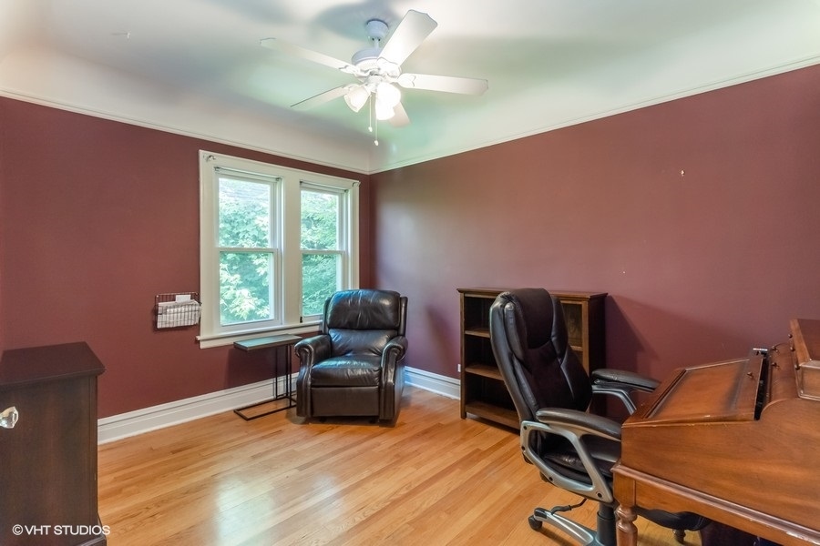 6129 North Mason Avenue Chicago, IL 60646 - Photo 9 of 22 a work room with furniture and windows