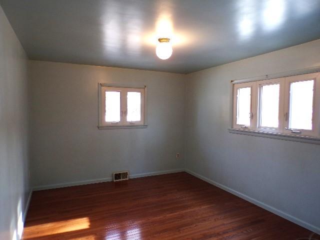 114 Duncan Circle Beaver, PA 15009 - Photo 21 of 30 an empty room with wooden floor and windows
