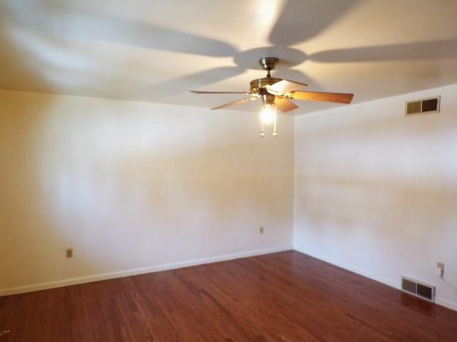 114 Duncan Circle Beaver, PA 15009 - Photo 22 of 35 en empty room with wooden floor and fan