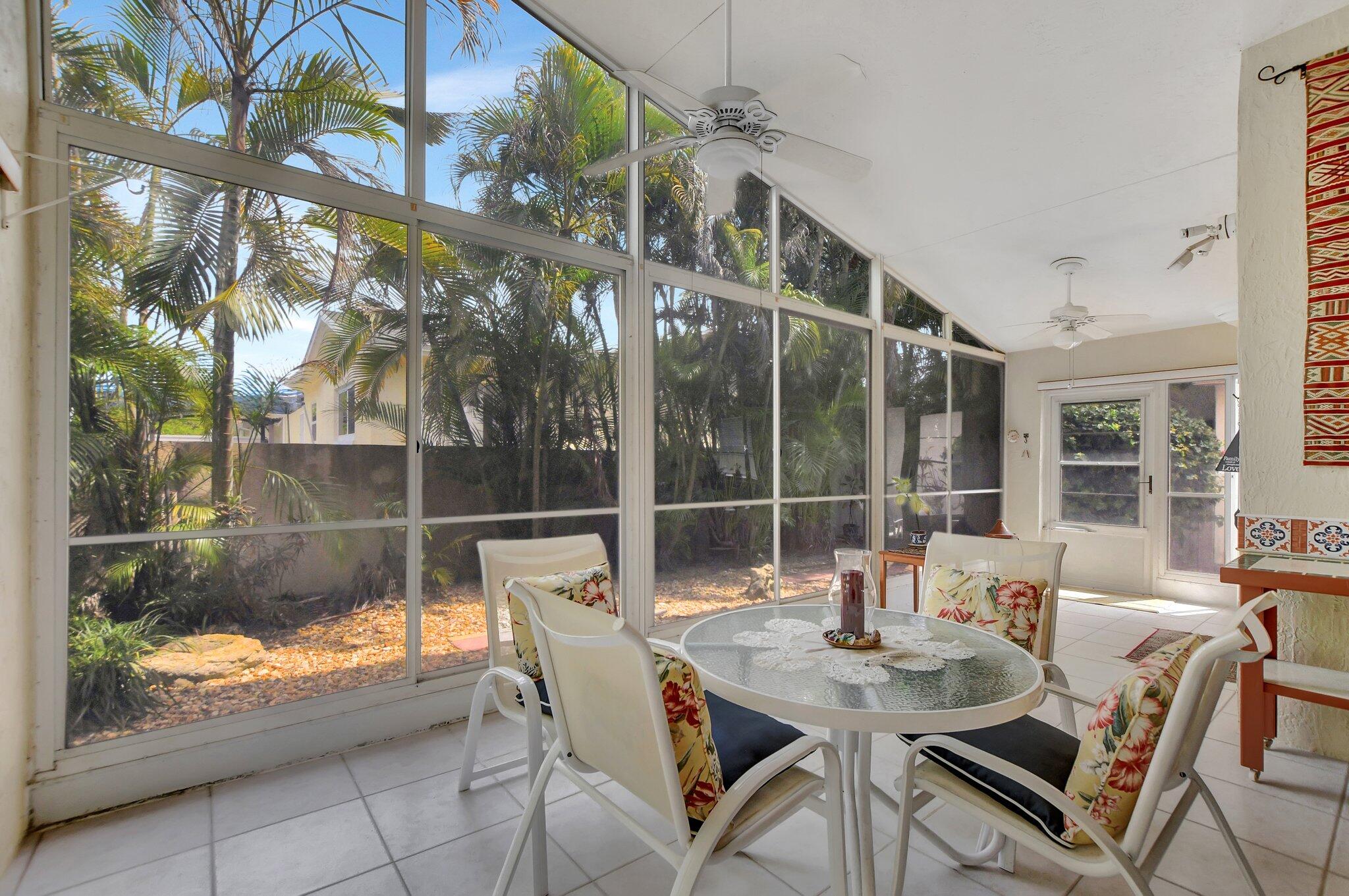 8853 Harrods Drive Boca Raton, FL 33433 - Photo 26 of 45 a dining room with furniture and window