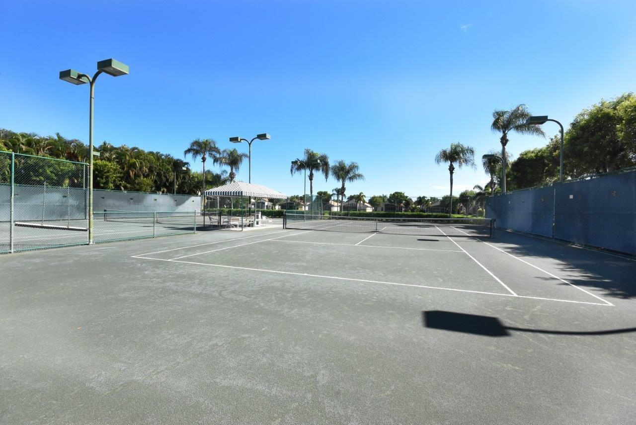 8853 Harrods Drive Boca Raton, FL 33433 - Photo 30 of 45 a view of a tennis court