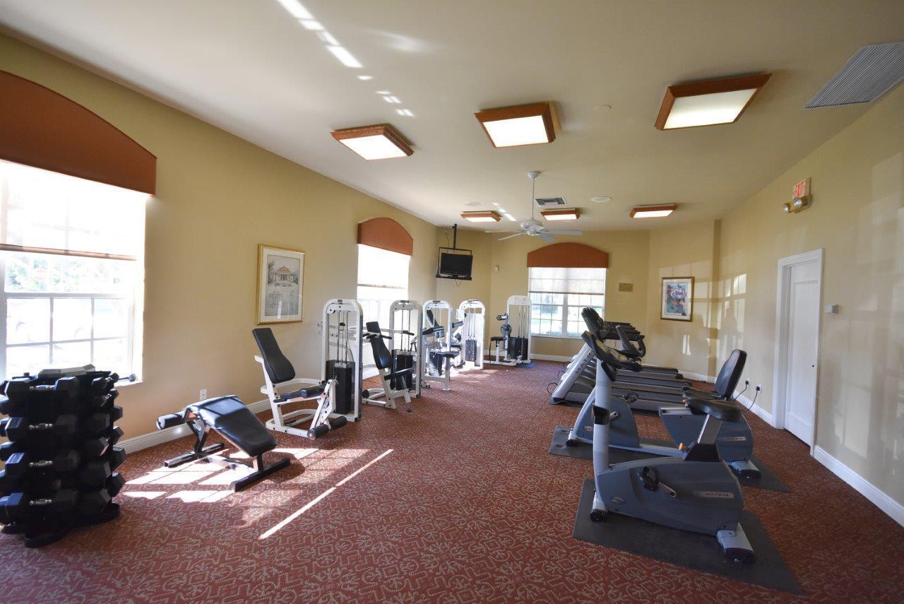 8853 Harrods Drive Boca Raton, FL 33433 - Photo 38 of 45 a view of a room with gym equipment