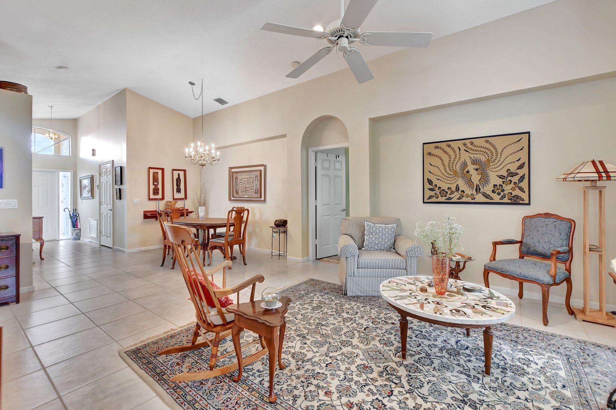 8853 Harrods Drive Boca Raton, FL 33433 - Photo 8 of 45 a view of a livingroom and dining room