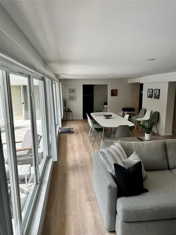 a kitchen with a stove and a refrigerator