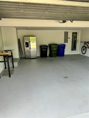 a sign that is in front of flowers