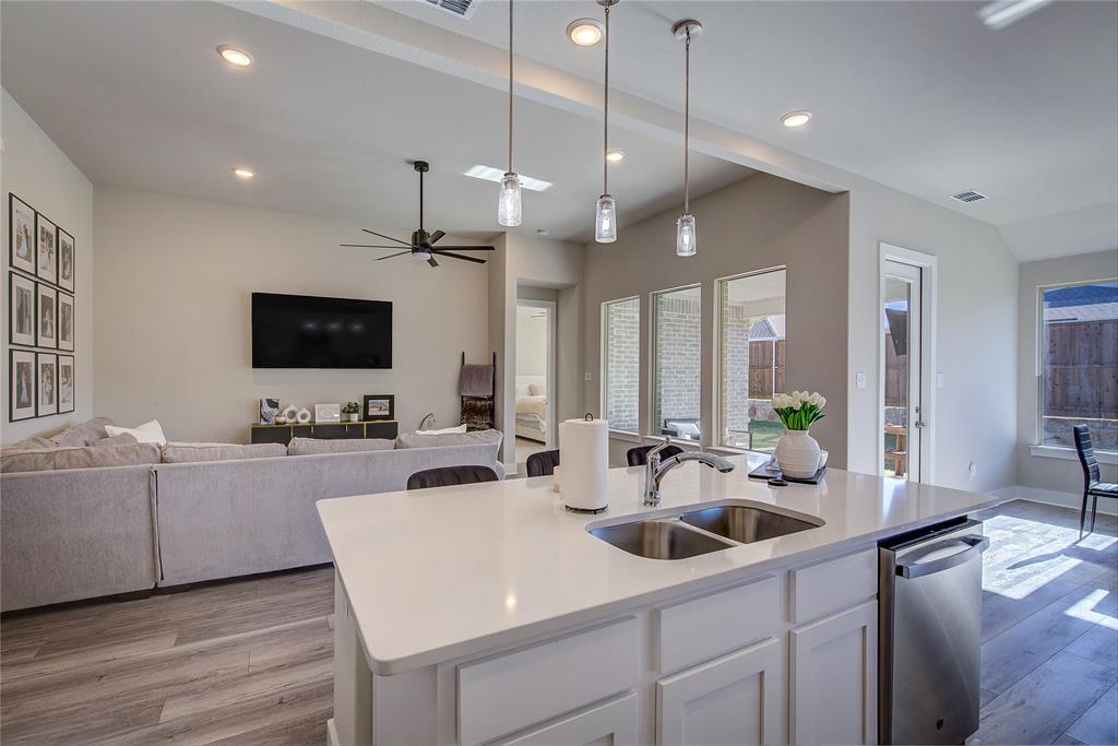 1872 Big Spring Drive Forney, TX 75126 - Photo 40 of 40 a kitchen with sink a counter and cabinets