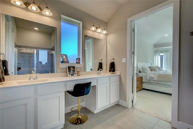 a view of a bathroom with a glass shower door