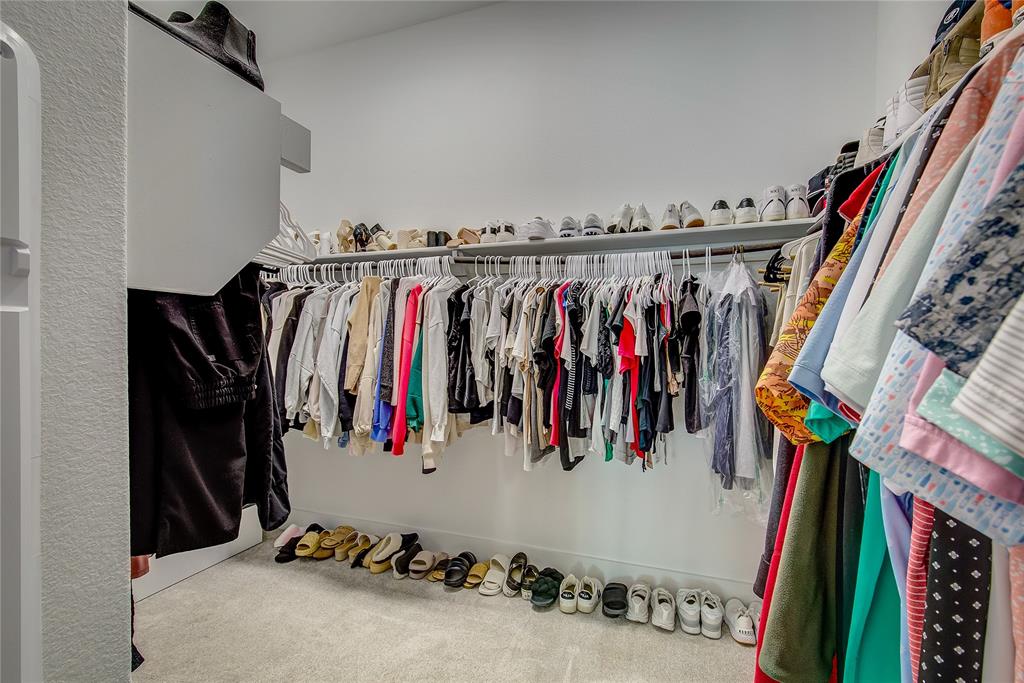 1872 Big Spring Drive Forney, TX 75126 - Photo 21 of 40 a view of walk in closet with clothes